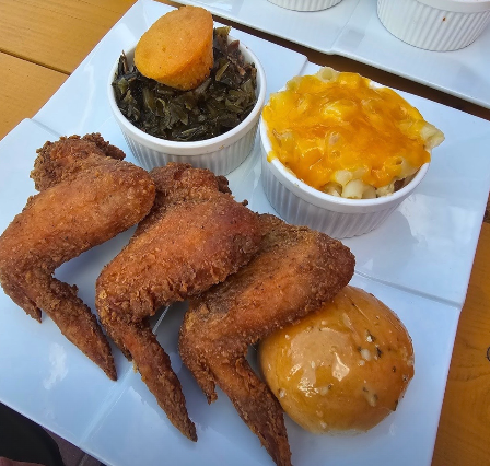 People dancing and hanging out near The Pink Unicorn